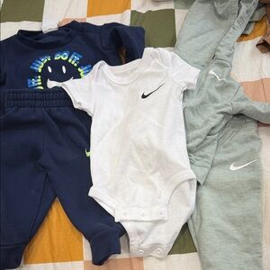 Nike White Baby Bodysuit with Black Logo